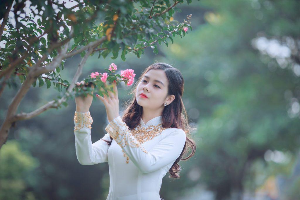 Asian Woman With Flower