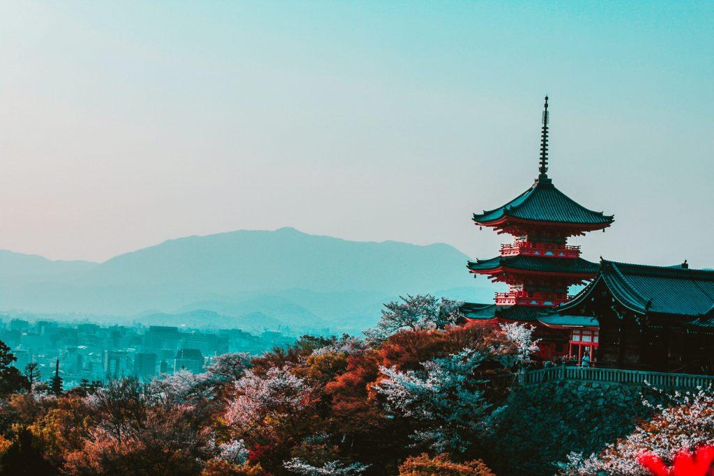 Red And Black Temple Surrounded By Trees Photo 402028 (1)